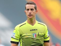 Genoa-Lazio: Sarà Ayroldi l’Arbitro del Monday Night. Tutti i Nomi del Team Arbitrale Una foto ravvicinata di un fischietto da arbitro, con uno sfondo neutro e un'illuminazione drammatica, a simboleggiare l'autorità della direzione di gara.